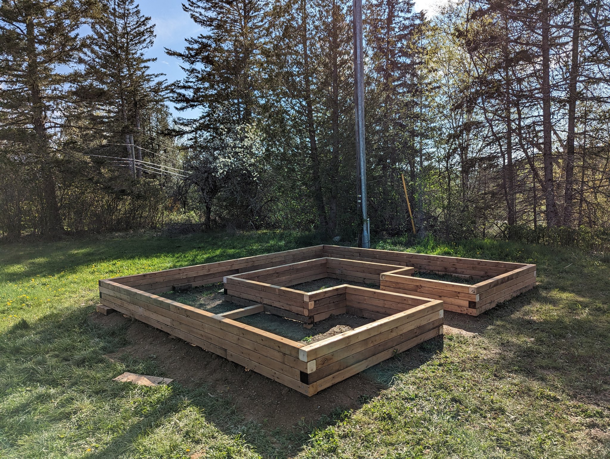 Assembled flowerbox timber walls and interior cross ties