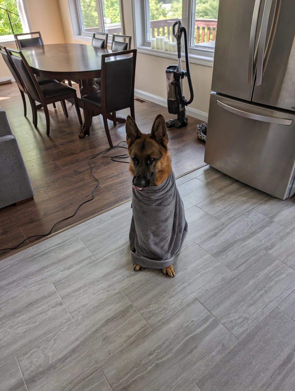 Toweling archer off after going for a swim in the river