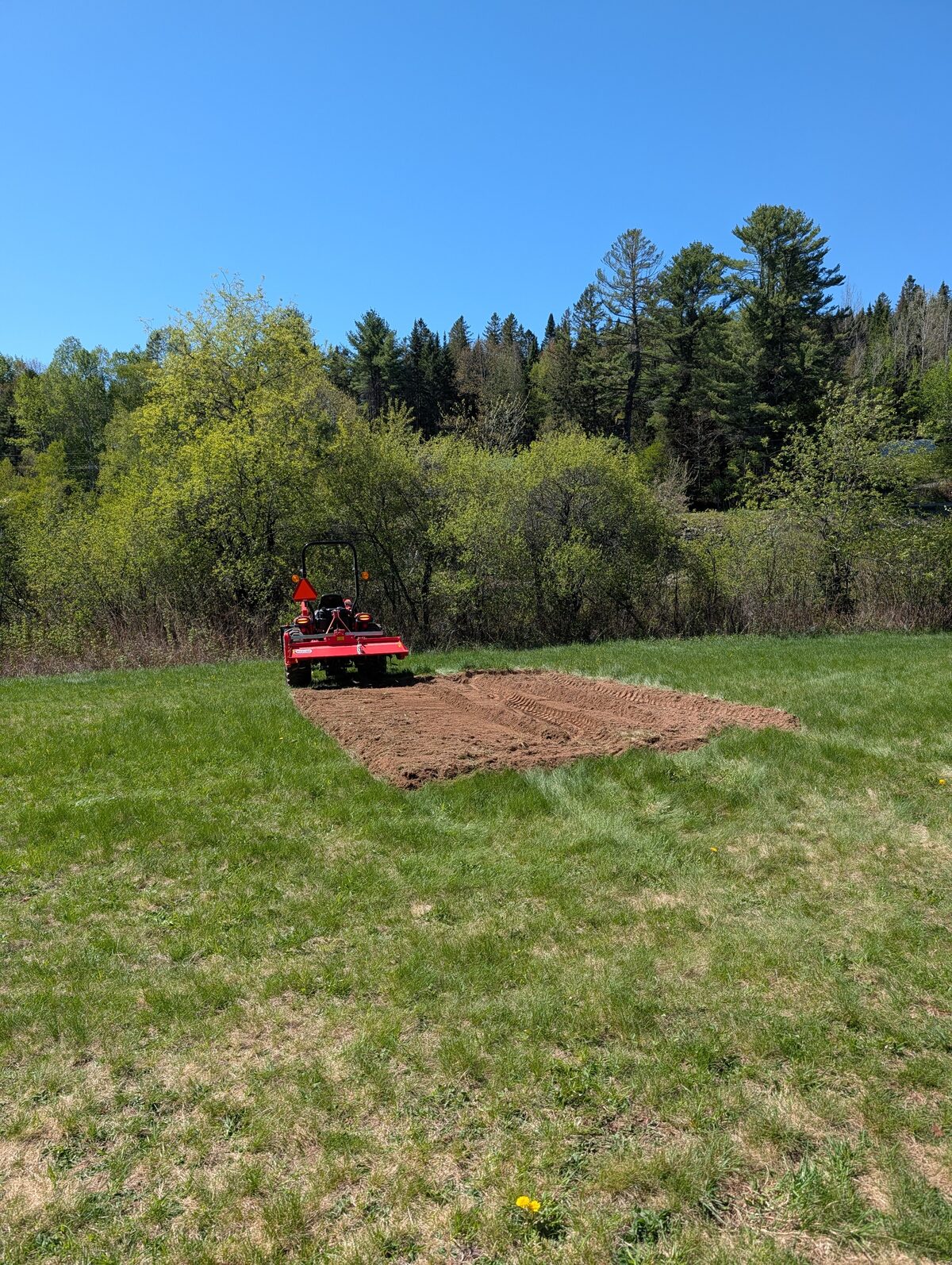 Tractor with tiller attachment